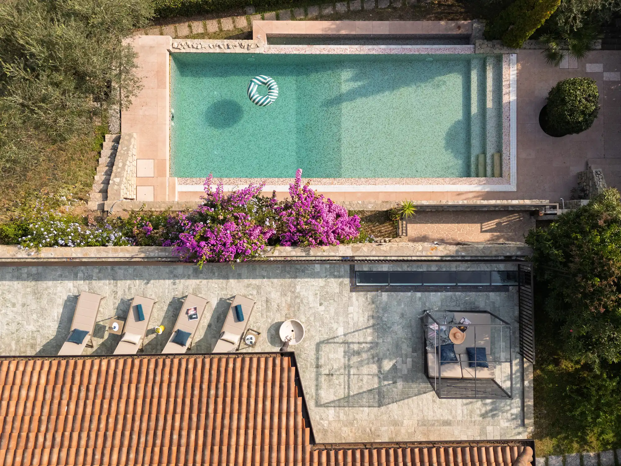 Aerial view of the pool, bougainvillea and sun terrace